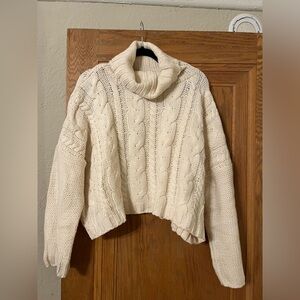 Ivory turtleneck cable knit sweater